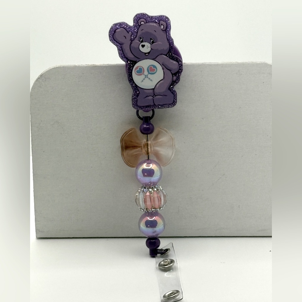 Purple Care Bear Badge Reel